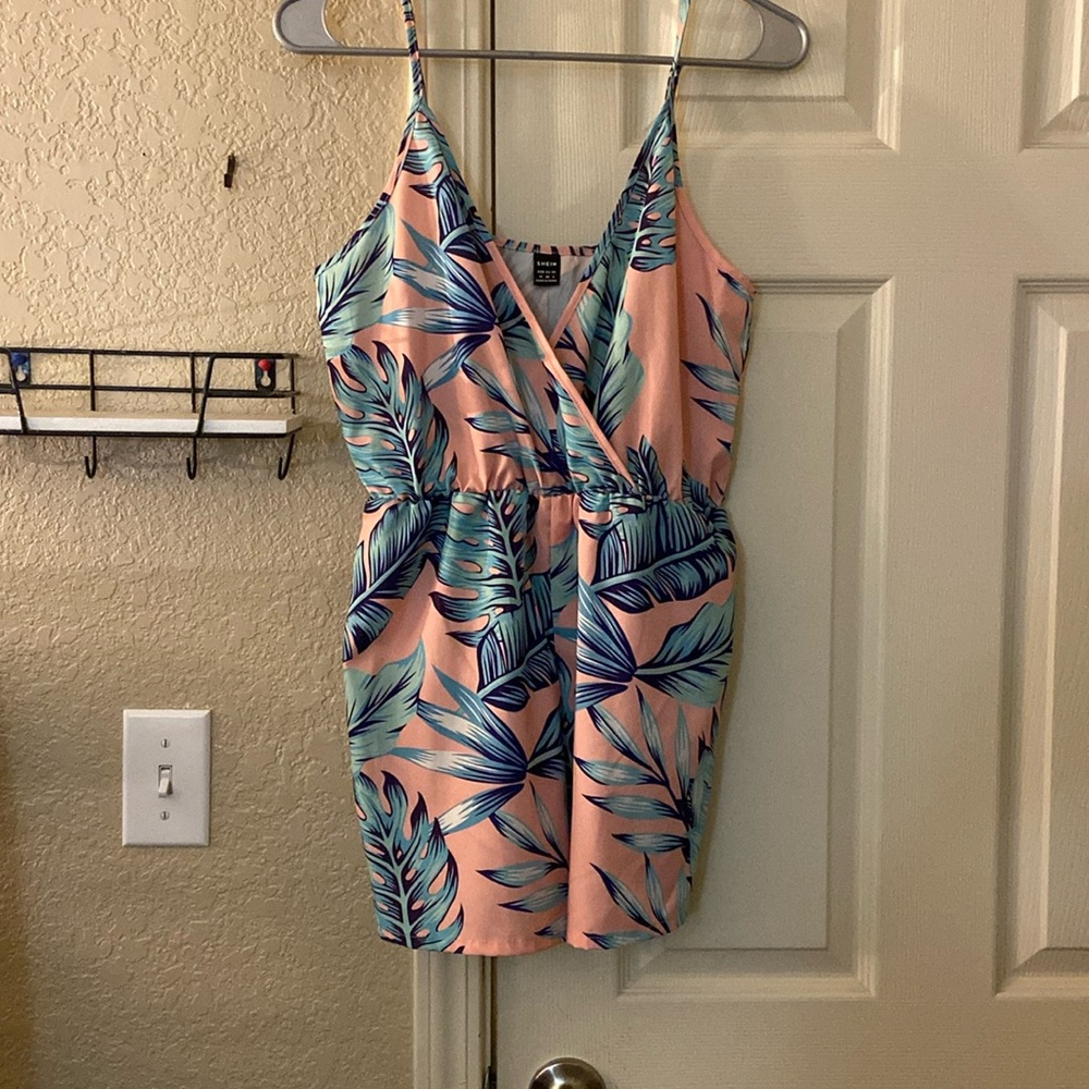 SHEIN beautiful Romper never been worn. Women’s size Medium.